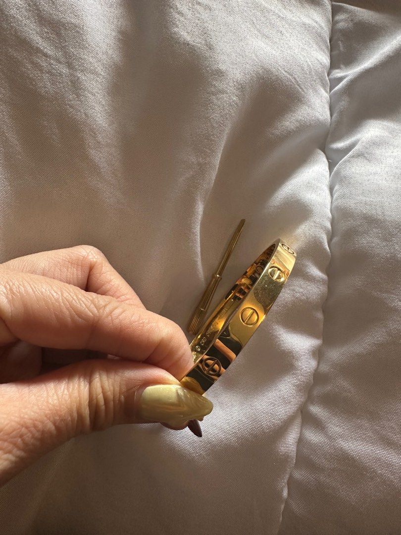Cartier Love Bracelet (Category: Bracelets) located in Quezon City. Submitted by lindthings (Listing ID 1396881978, Image 1). Description: Cartier bangle with key.