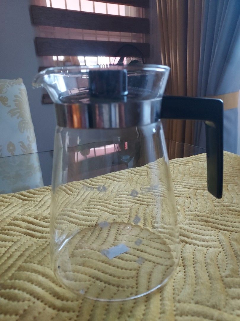 Coffee Tea Glass Pitcher (Category: Coffee & Tea Tableware) located in Batangas. Submitted by ms.d_preloveditems (Listing ID 1396849657, Image 1). Description: height-5inches bottom -4 inches diameter.