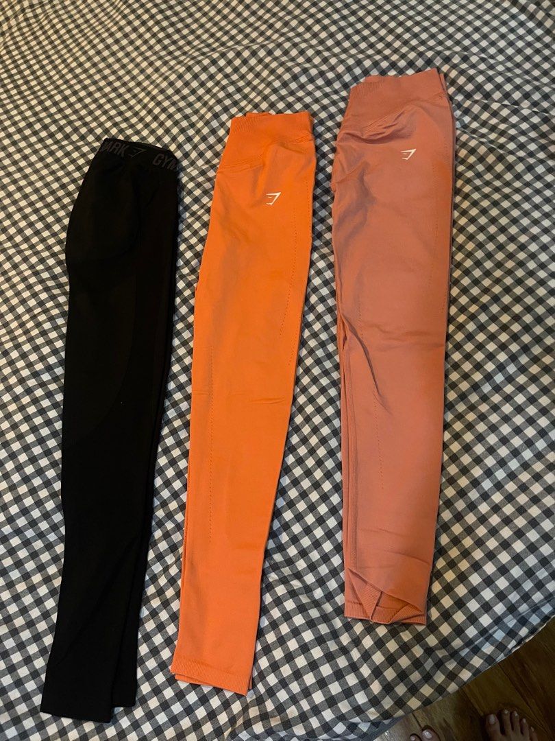 Gymshark Sweat Seamless Leggings (Category: Activewear) located in San Fernando. Submitted by graes777 (Listing ID 1396974034, Image 2). Description: 600 each!!!! - Gymshark Sweat Seamless Leggings - Size: Small - Colors: Aerospace Orange and Terracotta Pink - Designed for comfort and performance - Seamless technology for a smooth fit - Ideal for workouts or casual wear.