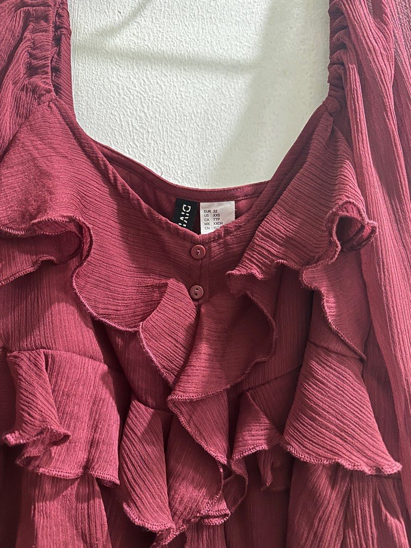 H&M Divided red dress with ruffles (Category: Dresses) located in Manila. Submitted by cchaiprincess (Listing ID 1396977997, Image 3). Description: Negotiable !! > cash first MOP: gcash - H&M Divided Burgundy Dress - Size: XXS (can fit up to medium) - Features: Square neckline, long sleeves, ruffle and button details - Lightweight rfs: alr used it twice.