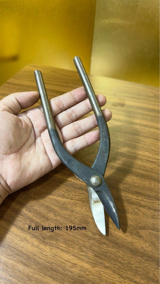 Japanese Bonsai Shears 195mm (Category: Gardening Tools & Ornaments) located in Davao. Submitted by furendorithrifter (Listing ID 1397031119, Image 1). Description: - Japanese bonsai shears - Designed for precision cutting - Curved blade - 195mm full length - Black and silver handles - Well-maintained - Ready for use - Perfect for shaping and pruning bonsai trees.