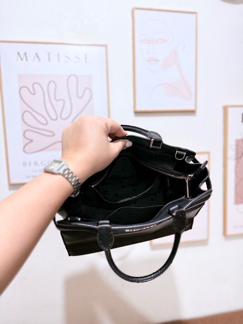 Kate Spade Staci Medium Satchel Bag (Category: Luxury Bags & Wallets) located in Rizal. Submitted by vinamarie.c (Listing ID 1397007448, Image 2). Description: - Kate Spade Staci Medium Satchel - Top handle and detachable shoulder strap - Multiple interior compartments - Front pocket - Gold-tone Kate Spade logo - Made of textured material For sale! Kate Spade Staci Medium Satchel Inclusions: Bag Comes with strap Bought this for 23k Selling it for