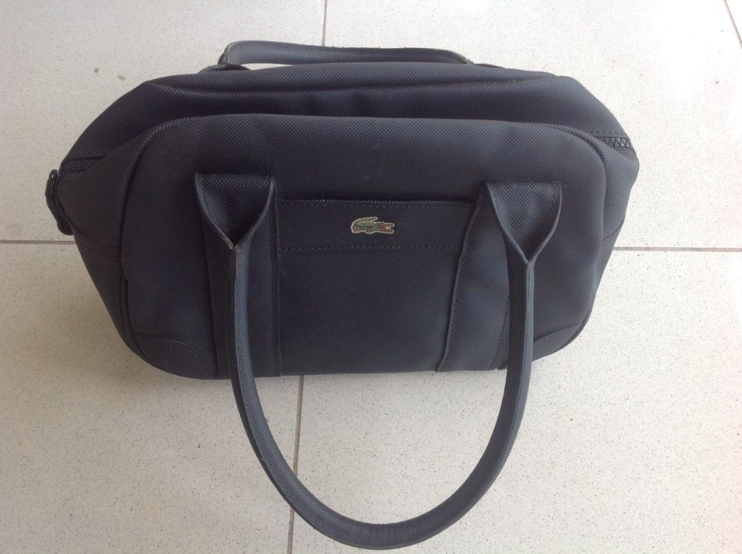 Lacoste Handbag (Category: Luxury Bags & Wallets) located in Cebu City. Submitted by brent726 (Listing ID 1396980301, Image 1). Description: Lacoste handbag Authentic No issues, good condition.