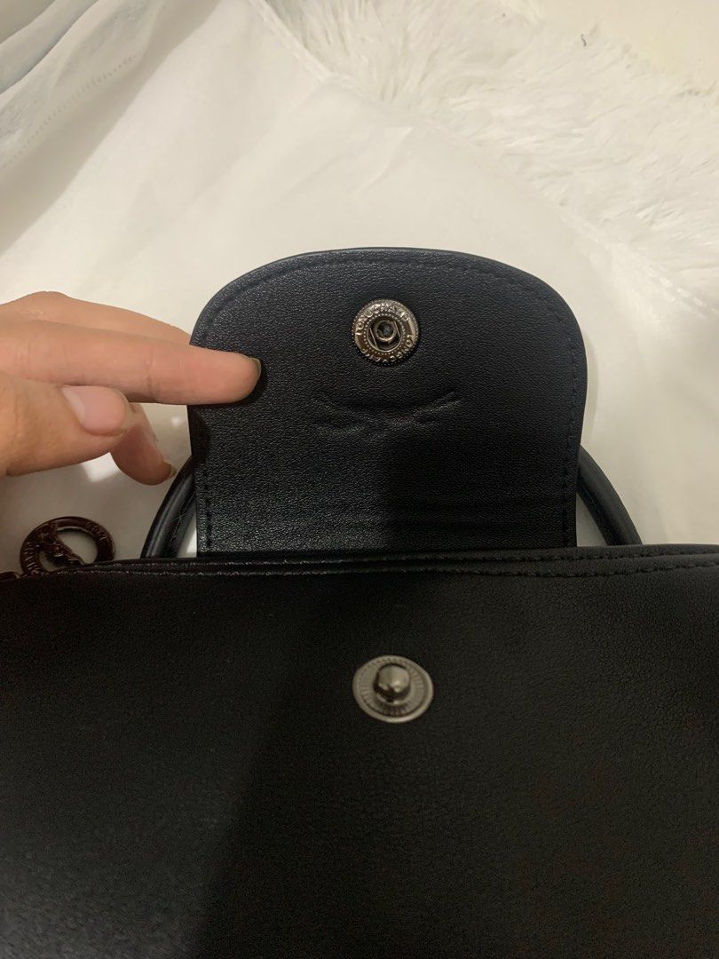 Leather Longchamp Le Pliage Mini in Black (Category: Luxury Bags & Wallets) located in Manila. Submitted by _girlfinds (Listing ID 1396937388, Image 3). Description: 👜 LONGCHAMP LE PLIAGE CUIR – MINI Luxury meets everyday function with this genuine leather version of the iconic Longchamp tote. Compact, versatile, and timeless — perfect for any occasion. ✨ 💎 Material: 100% genuine leather 🔐 Zip closure with snap button, ykk zipp 📁 2 inner flat