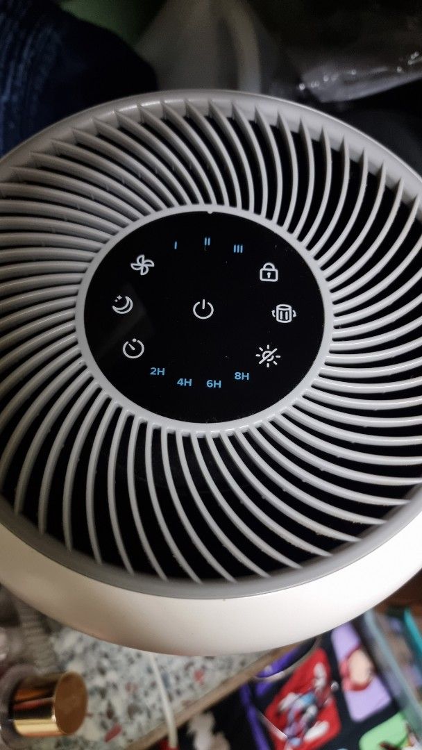Levoit Air Purifier (Category: Air Purifiers & Dehumidifiers) located in Manila. Submitted by sosita (Listing ID 1396880497, Image 2). Description: - Sleek white Levoit air purifier. - Control panel with power, fan speed, timer, and sleep mode settings. - Cylindrical design. - Perforated air intake. no filter included.
