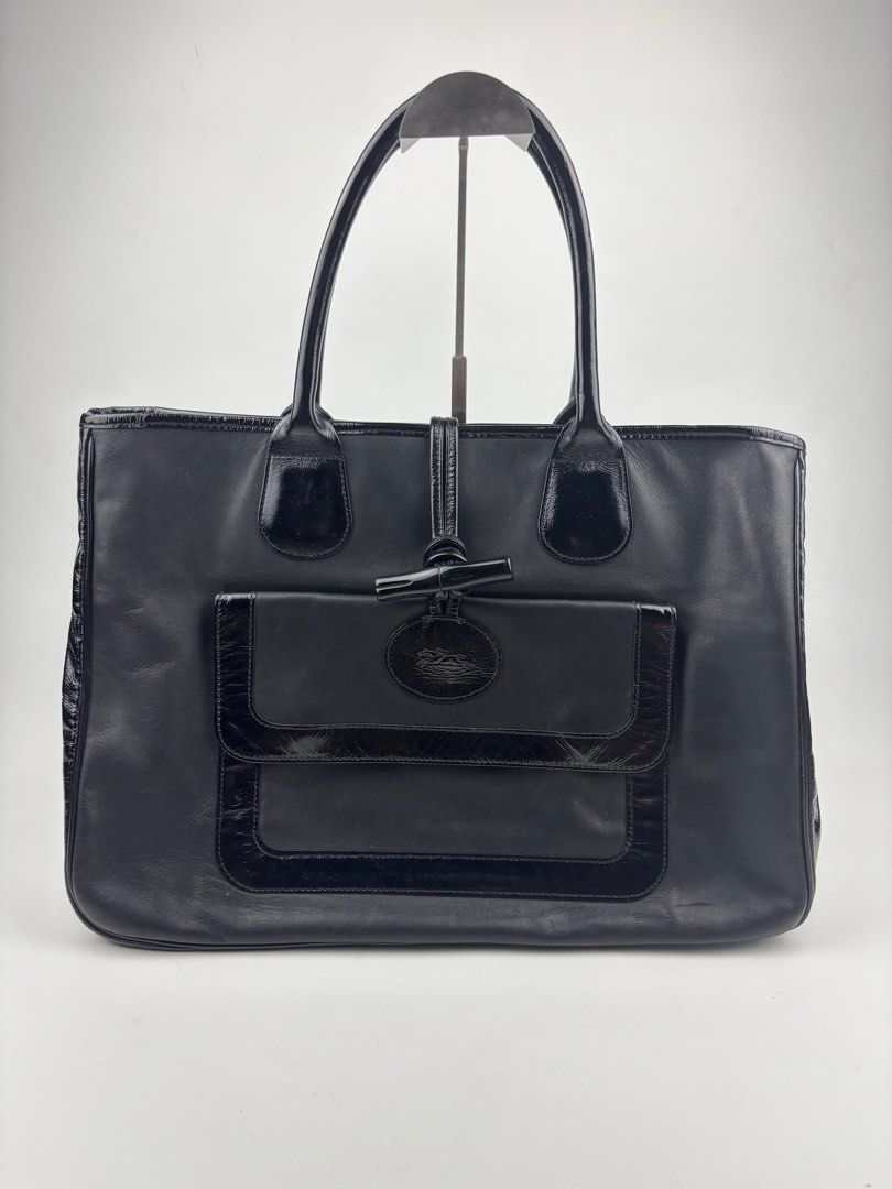 Longchamp Roseau Leather Tote (Category: Luxury Bags & Wallets) located in Makati City. Submitted by ragrepository (Listing ID 1396994581, Image 1). Description: Longchamp Roseau Leather Tote Height-12” Width-17” Handle drop- 7” Condition- 9/10 Flaw- Minor signs of usage .