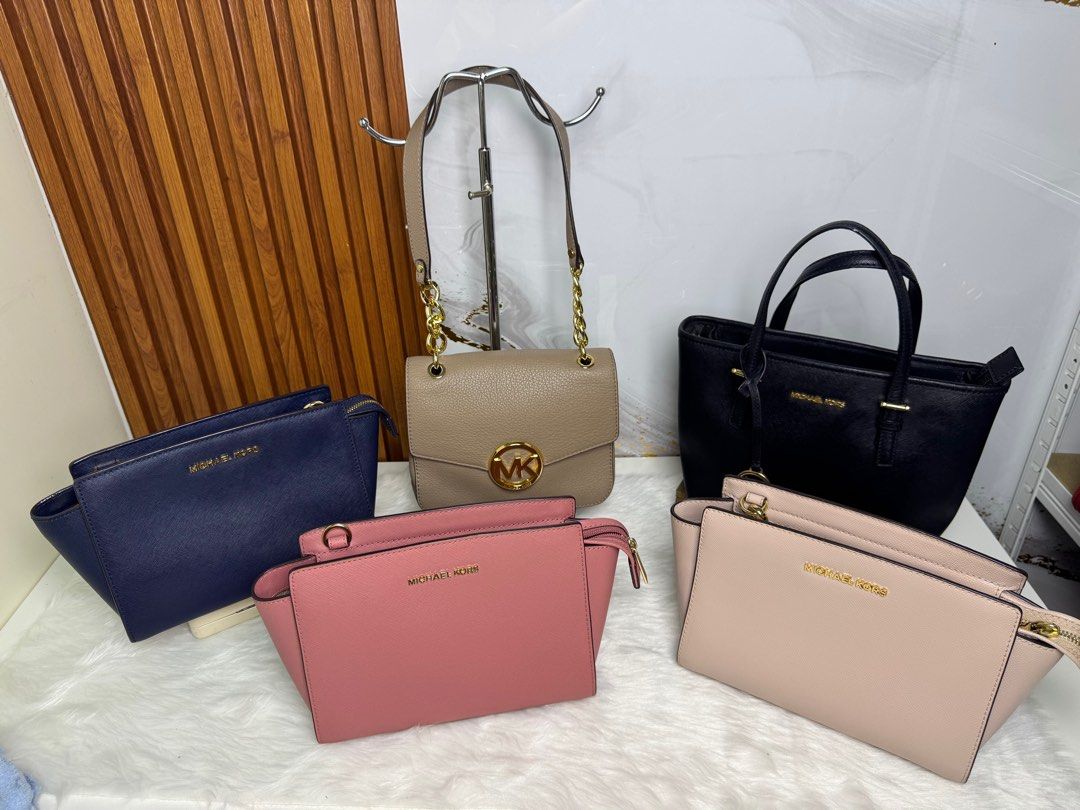 Michael Kors Handbags - Various Colors (Category: Luxury Bags & Wallets) located in Baliuag. Submitted by triplemshopp09 (Listing ID 1397031596, Image 1). Description: original michael kors bags all in pristine condition. please message facebook page for more.