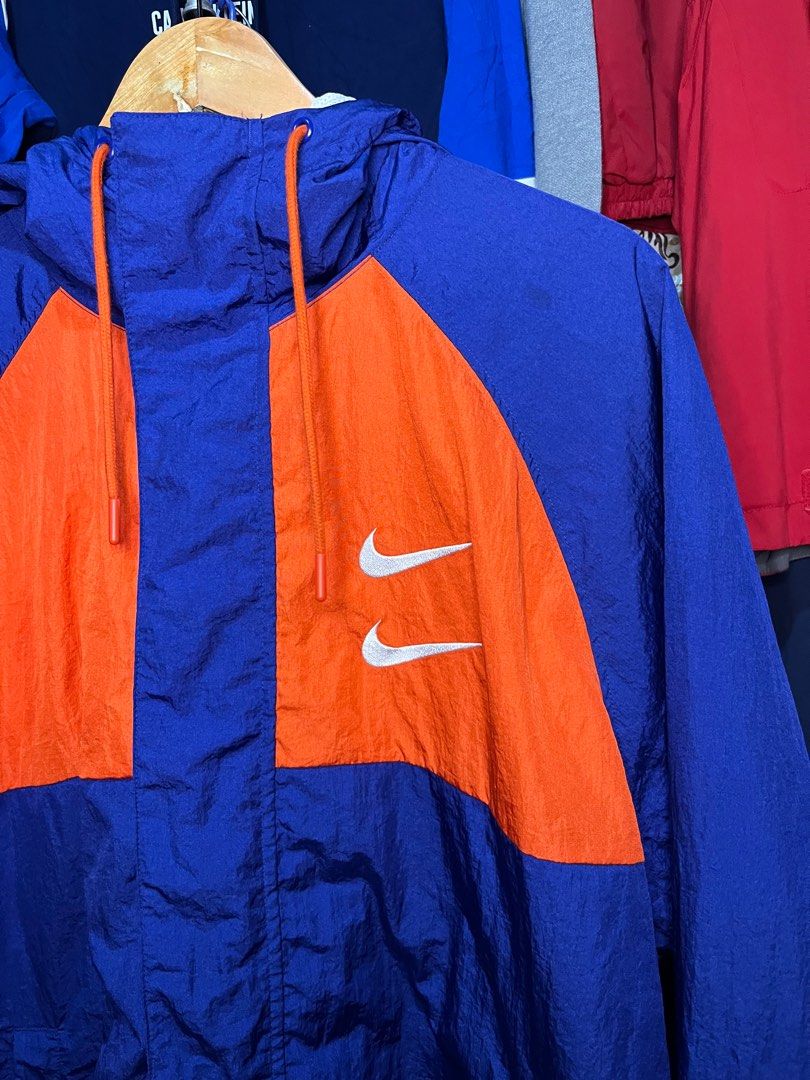Nike swoosh International Windbreaker (Category: Coats, Jackets and Outerwear) located in Sindangan. Submitted by boldgem_c9298e (Listing ID 1397018537, Image 2). Description: Nike International Windbreaker Condition: Excellent Size: XXL on tag Dimensions:25x29 Colorate: 9.5 para safe ❌Issue: light yellow stain sa backpart See detailed photos 📍Location: Mindanao Color may vary due to Lighting Fb acc: Edong Thriftees .