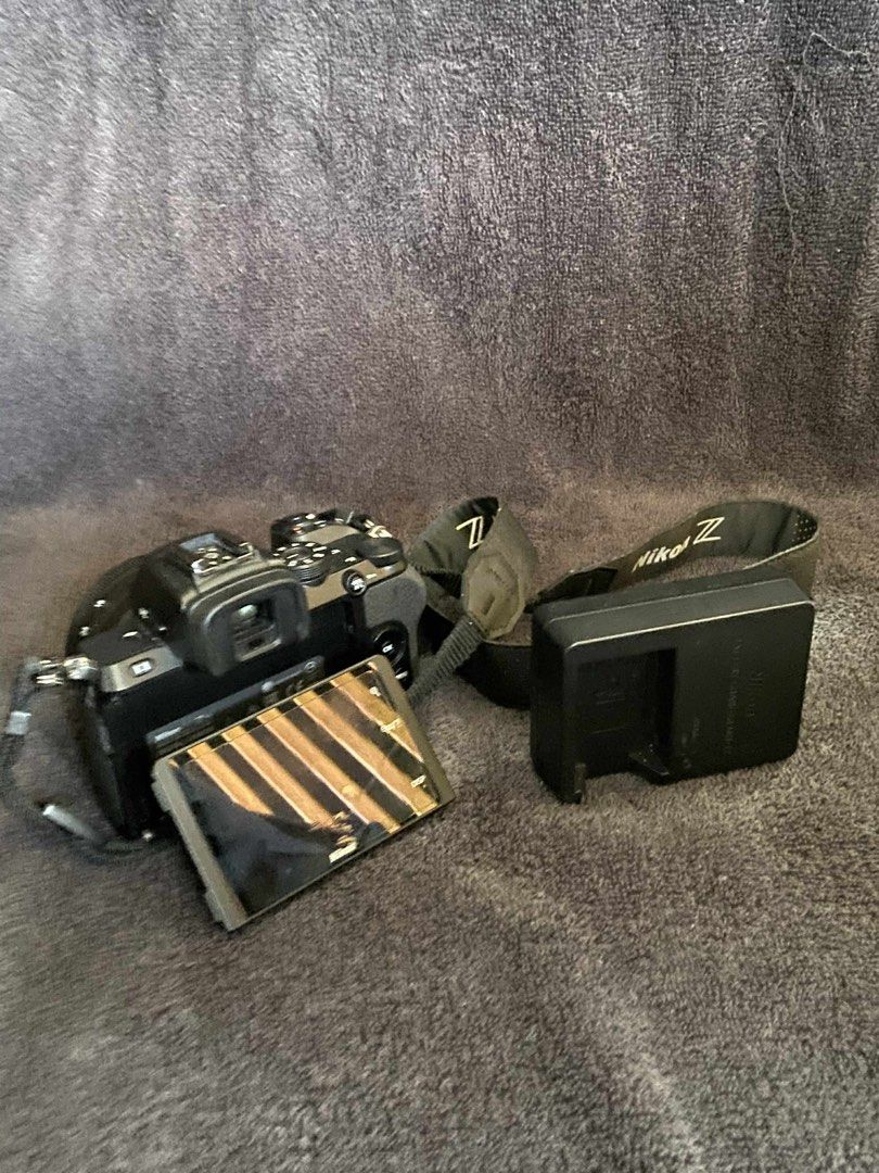 Nikon Z50 Mark I (Category: Cameras) located in Manila. Submitted by shinaizawa31209 (Listing ID 1396850631, Image 2). Description: 📸 For Sale: Nikon Z50 Mark I ‼️Rush Sale‼️ ✨ Features & Inclusions: 🔹 Camera Body: Nikon Z50 Mark I — A powerful yet compact mirrorless camera designed for photographers and creators. It comes with a 20.9MP APS-C CMOS sensor, EXPEED 6 image processor, and shoots stunning 4K UHD videos. Known for its portability and