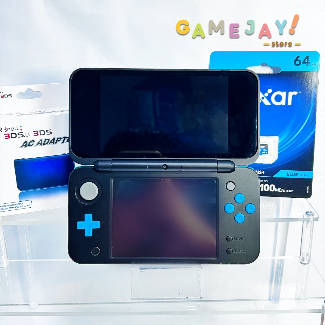 Nintendo New 2DS XL (Category: Nintendo) located in Manila. Submitted by gamejaystore (Listing ID 1396891476, Image 1). Description: For Sale: Nintendo 2DS XL - Black & Blue Turquoise Item is in great condition, modded/jailbreak can download and play any games on Hshop. All buttons, triggers, camera, card slot are working. No issue playing Nintendo 3DS and DS games. Inclusions: - Nintendo 2DS XL - Charger - 64GB Lexar SD Card (Authentic) - Stylus