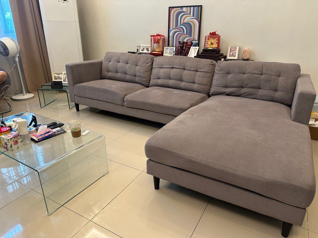 Our Home L-shaped sofa (Category: Sofas) located in Quezon City. Submitted by merchperchco (Listing ID 1396918922, Image 1). Description: Our Home Large L-shaped sofa Color gray See photos for the dimension In good condition Bought for around 57,000 in 2022 Rfs: change of living room theme Pick up location: Scout area, QC Shipping fee c/o buyer.