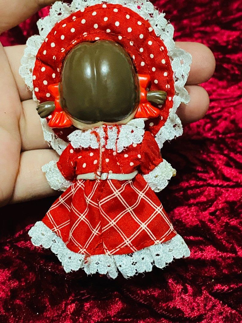 Peko Doll Keychain 250 (Category: Vintage Collectibles) located in Zamboanga. Submitted by kawaii_omocha_est2020 (Listing ID 1396962318, Image 3). Description: - Vintage Japanese girl doll keychain - Features a doll in a red dress with white lace trim - Matching hat included - Doll has a cute expression - Charming collectible item ✅Mine now/ Pay now ✅ Please scan all photos for more details. ✅ Manage your expectation. Most of items are preloved. 