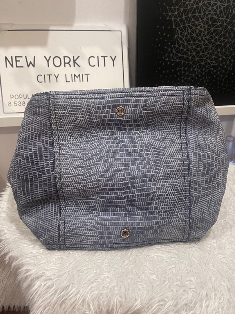Saint Laurent Downtown Navy Blue shoulder bag (Category: Luxury Bags & Wallets) located in Subic. Submitted by dani70 (Listing ID 1396915237, Image 2). Description: - Authentic Saint Laurent Downtown handbag - Color: blue gray textured python embossed leather - Textured exterior - Double top handles - Multiple zippered compartments - Silver-tone hardware - Snap closure - Structured shape - Spacious interior - Bottom has two snap closures - sign o