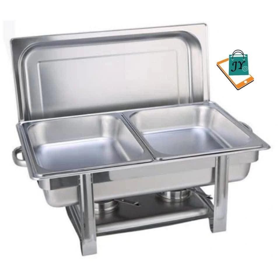 Stainless Steel Chafing Dish with Dual Compartments (Category: Food Organization & Storage) located in Manila. Submitted by ncledlcrz (Listing ID 1396972588, Image 1). Description: - Dual compartment design - Heat-proof and stable - Polished stainless steel finish - Easy-to-use lid - Made of high-quality stainless steel - Ideal for events.