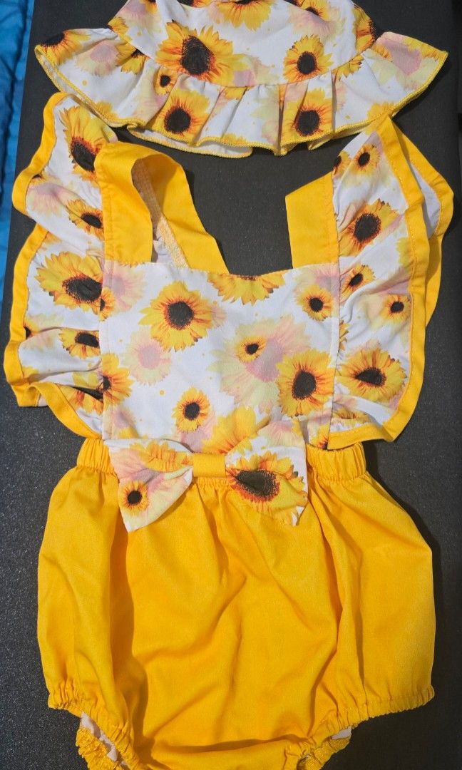 Sunflower outfit (Category: Babies & Kids Fashion) located in Navotas City. Submitted by declutteringwithkc (Listing ID 1396973017, Image 1). Description: Sunflower onesie Used twice only Like-new.