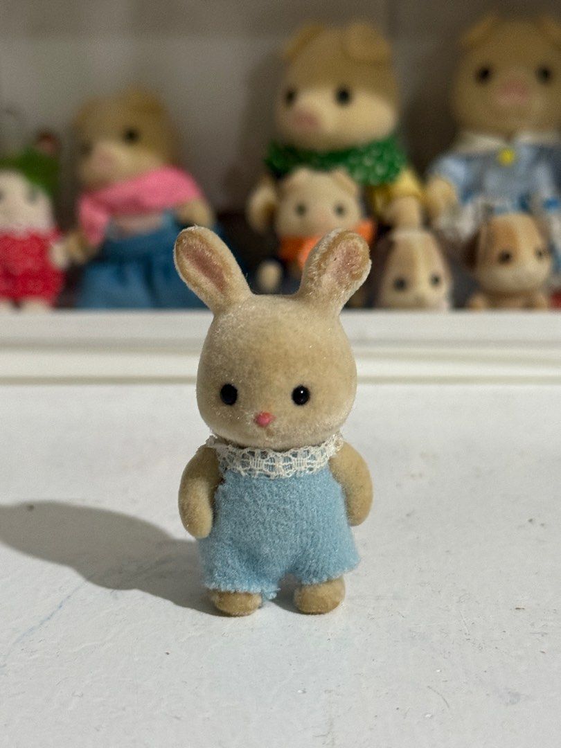 Sylvanian Families Milk Rabbit Baby Figure (damaged) (Category: Designer & Blind Box Toys) located in Antipolo. Submitted by kiksy.closet (Listing ID 1397031641, Image 1). Description: Sylvanian Families Milk Rabbit Baby Figure (damaged) - with major flaws (stains, bald parts on the ears) - kindly check posted pics to evaluate the condition.
