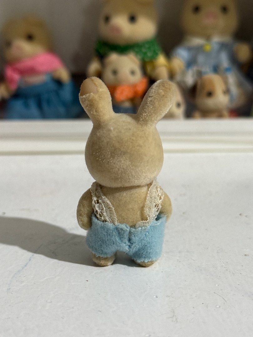 Sylvanian Families Milk Rabbit Baby Figure (damaged) (Category: Designer & Blind Box Toys) located in Antipolo. Submitted by kiksy.closet (Listing ID 1397031641, Image 2). Description: Sylvanian Families Milk Rabbit Baby Figure (damaged) - with major flaws (stains, bald parts on the ears) - kindly check posted pics to evaluate the condition.