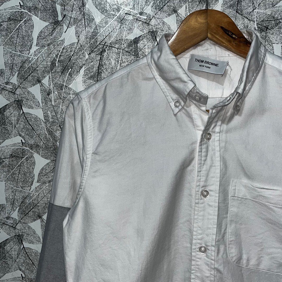 Thom Browne // White Oxford Grey Patch Shirt (Category: Luxury Apparel) located in Daraga. Submitted by th3cliquejunks (Listing ID 1397008747, Image 3). Description: Thom Browne // White Oxford Grey Patch Shirt Excellent Condition No major flaw Size 1 on tag - 19”W x 27-28”L 1,250 Dm to purchase 📲.