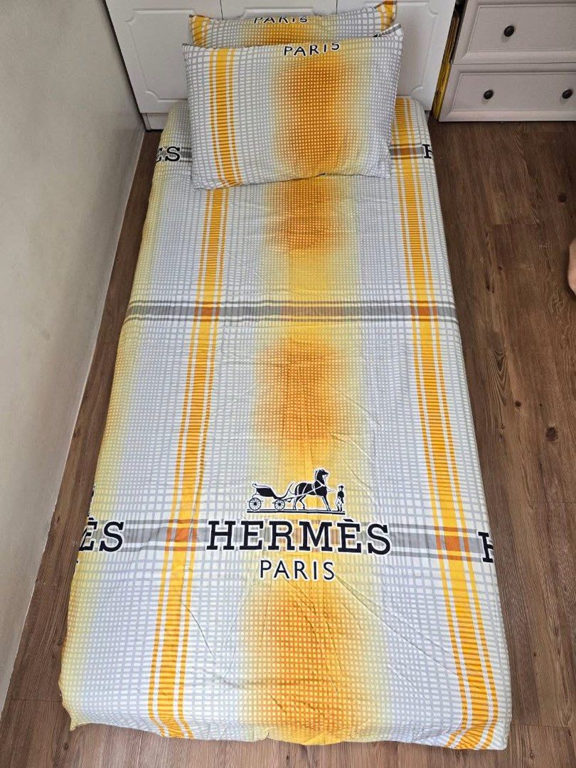 Bed Sheet for Single Bed With 2 Pillow Case (Category: Bedding & Towels) located in Manila. Submitted by styledbyjemstaana (Listing ID 1397175323, Image 1). Description: - Single bed bedding set - Includes: fitted sheet and two pillowcases - Used once as props sa photoshoot .