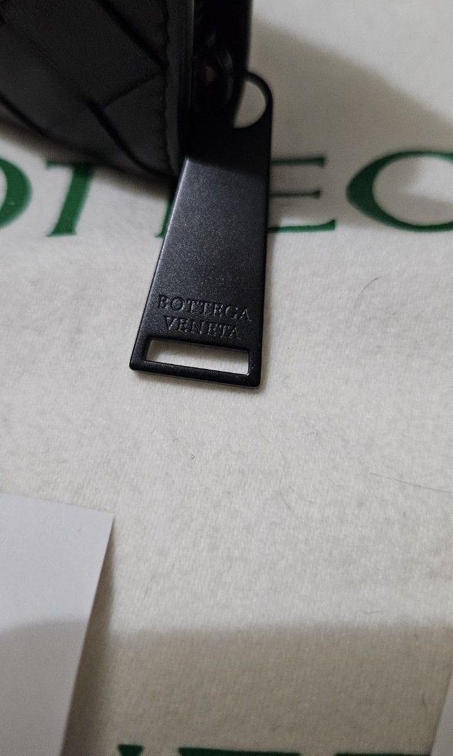 Bottega Veneta zippy wallet (Category: Luxury Bags & Wallets) located in Paranaque City. Submitted by beleescloset (Listing ID 1397090274, Image 3). Description: Guaranteed authentic with cards and dust bag Dark brown color.