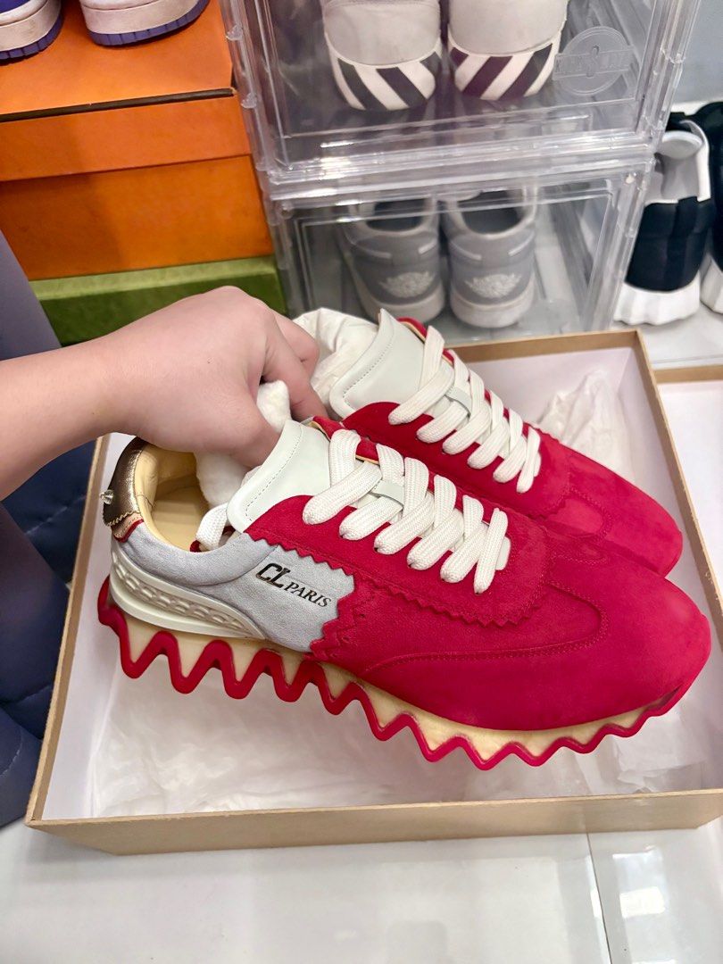 Christian Louboutin Gray & Red Loubishark (Category: Sneakers) located in Angeles City. Submitted by _rlsdg (Listing ID 1397149744, Image 1). Description: Christian Louboutin Gray & Red Loubishark Sneakers - size 41M - bought sa states, but na-stuck na lang kasi it’s too big for my father.