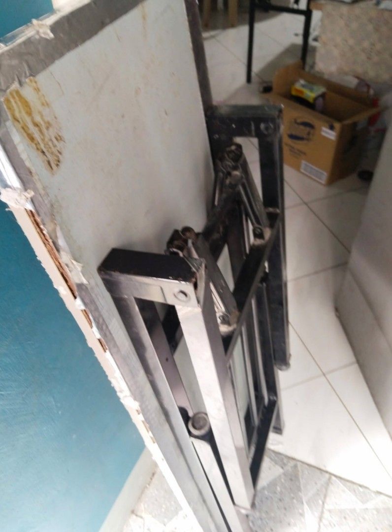 Folding Table 120 x 40 cm (Category: Tables & Sets) located in Quezon City. Submitted by vincentgo2024 (Listing ID 1397106728, Image 3). Description: - Folding table - Size: 120 x 40 cm - Features a black metal frame - Folds for convenient storage - Ideal for study or workspace - In good working condition.