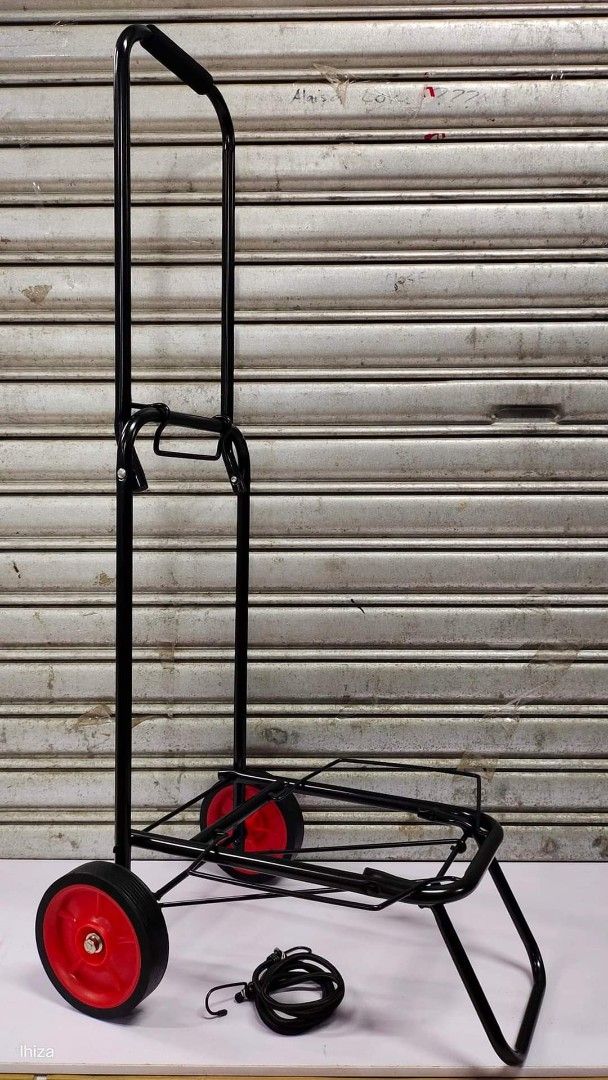 Folding Trolley (Category: Strollers) located in Manila. Submitted by lyfrancois14 (Listing ID 1397038441, Image 1). Description: - Foldable h - Sturdy black frame - Red wheels - Comfortable handle - Folds for easy storage - Ideal for moving boxes and groceries - Durable and easy to use.
