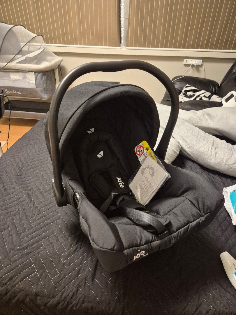 Joie Infant Carrier (Category: Car Seats) located in Manila. Submitted by cglt2019 (Listing ID 1397038035, Image 1). Description: Features carrying handle, safety straps. Joie logo visible. Like new comes with manual and box RFS: switched to a car seat.