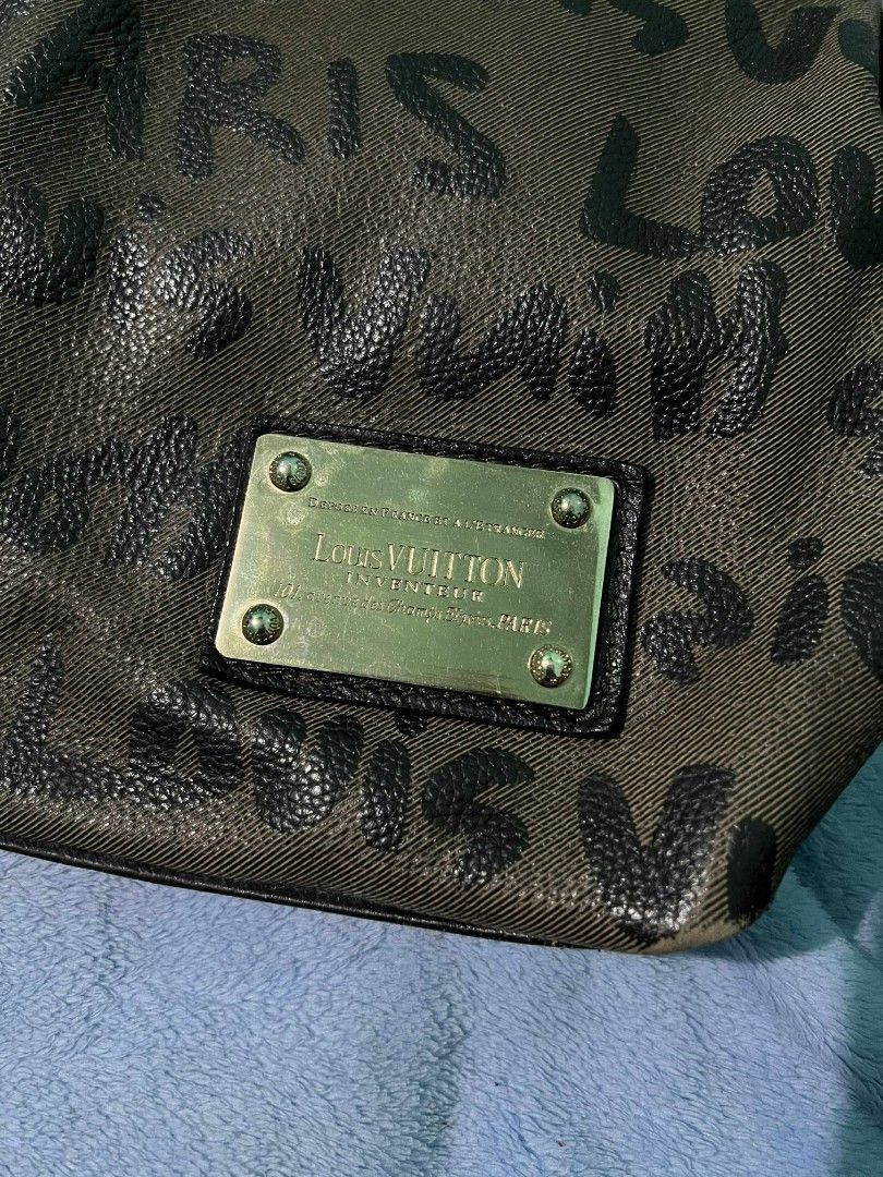 Louis Vuitton Graffiti Partitioned Handbag/ Hobo (Category: Luxury Bags & Wallets) located in Cabuyao City. Submitted by zoeraven7174991 (Listing ID 1395924637, Image 2). Description: - Louis Vuitton handbag - Graffiti print design - Brown handles - Gold-tone plaque - Spacious interior -limited edition -vintage collection -geniune leather -still NGA - --.