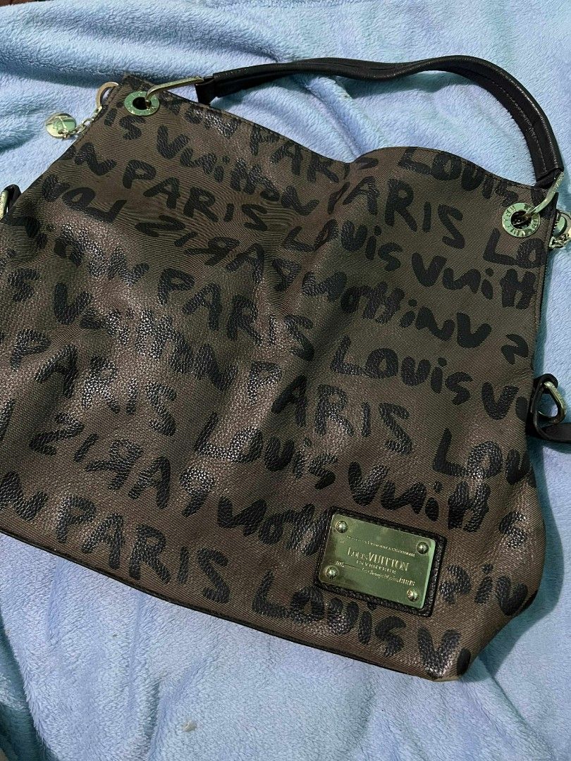 Louis Vuitton Graffiti Partitioned Handbag/ Hobo (Category: Luxury Bags & Wallets) located in Cabuyao City. Submitted by zoeraven7174991 (Listing ID 1395924637, Image 3). Description: - Louis Vuitton handbag - Graffiti print design - Brown handles - Gold-tone plaque - Spacious interior -limited edition -vintage collection -geniune leather -still NGA - --.
