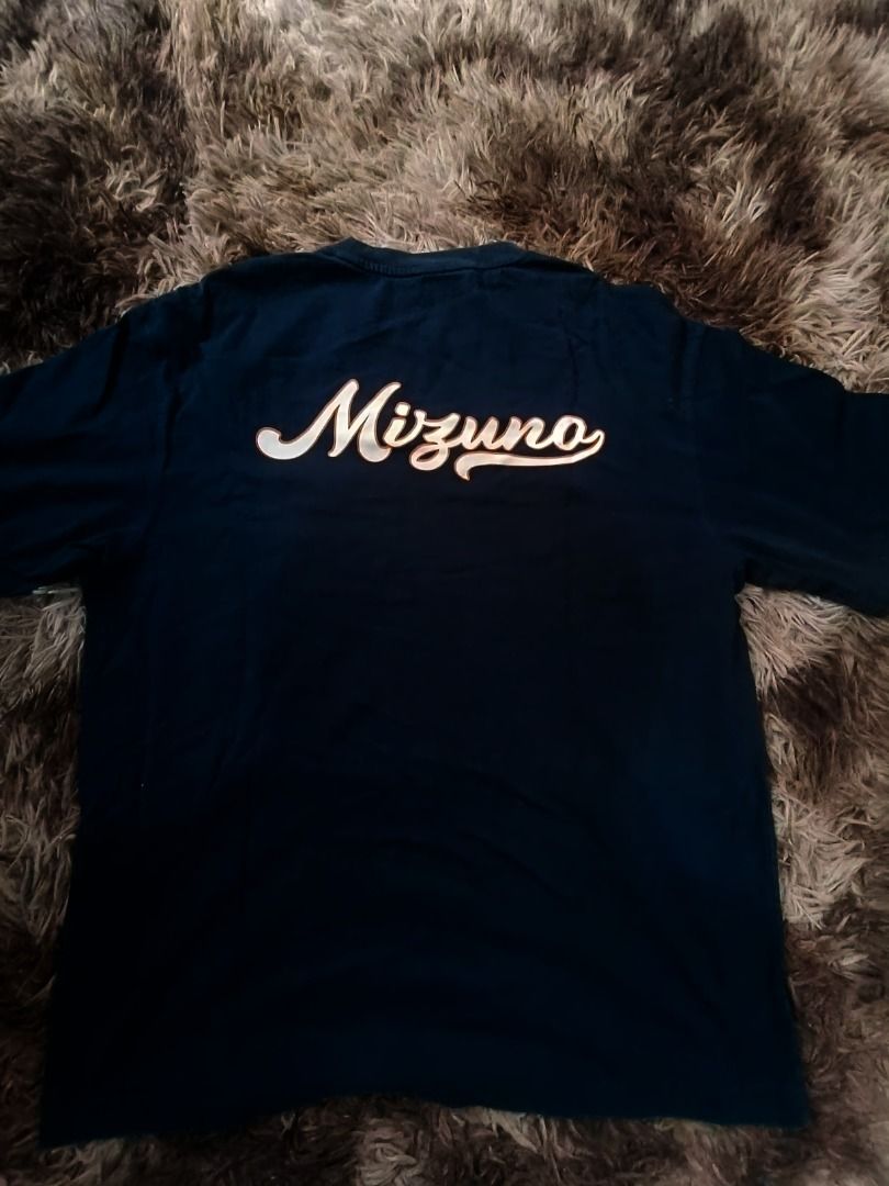 Mizuno Navy Blue T-shirt (Category: Tshirts & Polo Shirts ) located in Kalibo. Submitted by lorenz.503 (Listing ID 1397130799, Image 2). Description: - Navy blue Mizuno t-shirt - Features Mizuno logo on front - Mizuno name on back - Classic crew neck design - Short sleeves - Made from comfortable material - Ideal for casual wear - Simple and stylish design 📌23 X 27 📌GOOD CONDITION and Color Rate 📌With minimal Issue.