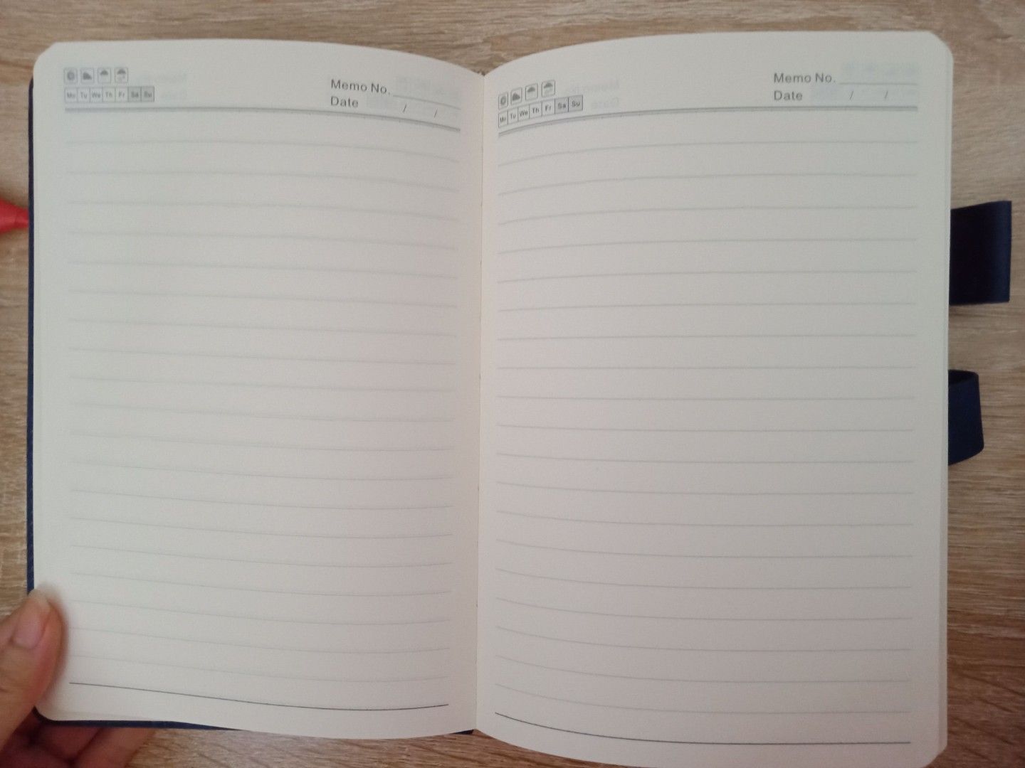 Notebook (Category: Stationery & School Supplies) located in Singapore. Submitted by 22tinkletinkle (Listing ID 1397055657, Image 4). Description: - Brand new leather covered notebook - Features a secure clasp closure - Includes a built-in calendar and important festival date - Ideal for planning and journaling.