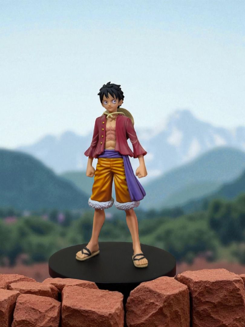 One Piece Monkey D. Luffy Figure (Category: Figurines & Statues) located in Manila. Submitted by extraricecollectibles (Listing ID 1397147976, Image 1). Description: - Monkey D. Luffy figure - From the anime series One Piece - Features Luffy's iconic outfit: red jacket, yellow shorts, and straw hat - Standing on a black base - Detailed collectible item.
