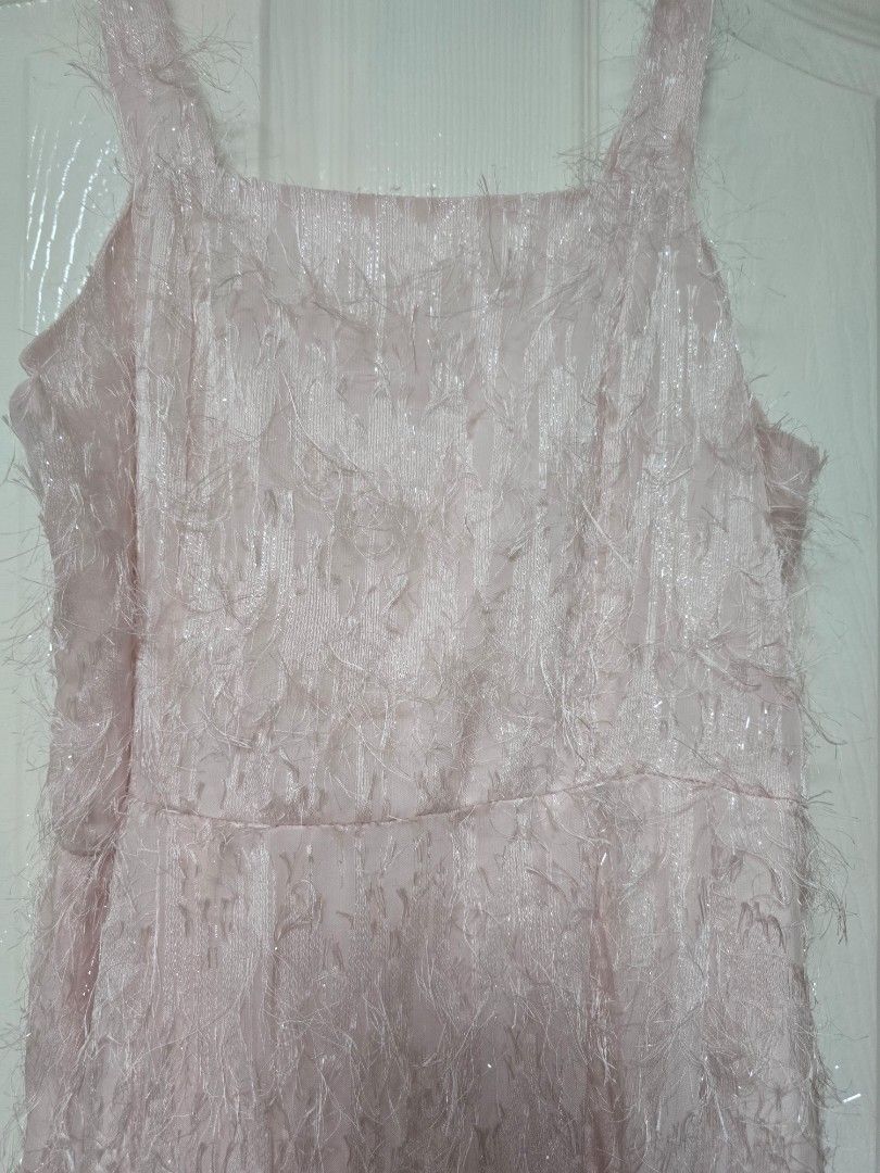 Ostrich Fur Dress (Category: Evening dresses & gowns) located in Navotas City. Submitted by declutteringwithkc (Listing ID 1397054252, Image 1). Description: Used once only Party long dress Size L to Xl Bought in Shein app.