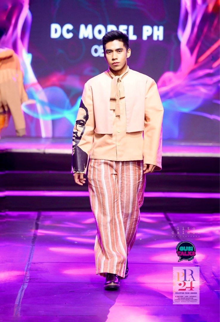 Peach Suit with Portrait Detail (Category: Coats, Jackets and Outerwear) located in Manila. Submitted by jericperdido (Listing ID 1397143683, Image 3). Description: Stylish peach suit featuring a unique portrait detail on the sleeve. The jacket has a distinctive bow tie design and is paired with striped pants. This outfit is perfect for fashion events or special occasions. The suit is designed for a modern Barong and sophisticated look..