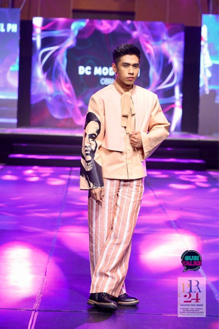 Peach Suit with Portrait Detail (Category: Coats, Jackets and Outerwear) located in Manila. Submitted by jericperdido (Listing ID 1397143683, Image 1). Description: Stylish peach suit featuring a unique portrait detail on the sleeve. The jacket has a distinctive bow tie design and is paired with striped pants. This outfit is perfect for fashion events or special occasions. The suit is designed for a modern Barong and sophisticated look..