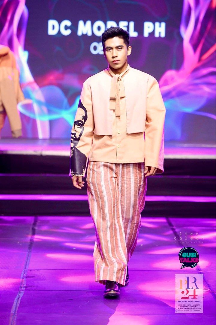 Peach Suit with Portrait Detail (Category: Coats, Jackets and Outerwear) located in Manila. Submitted by jericperdido (Listing ID 1397143683, Image 2). Description: Stylish peach suit featuring a unique portrait detail on the sleeve. The jacket has a distinctive bow tie design and is paired with striped pants. This outfit is perfect for fashion events or special occasions. The suit is designed for a modern Barong and sophisticated look..