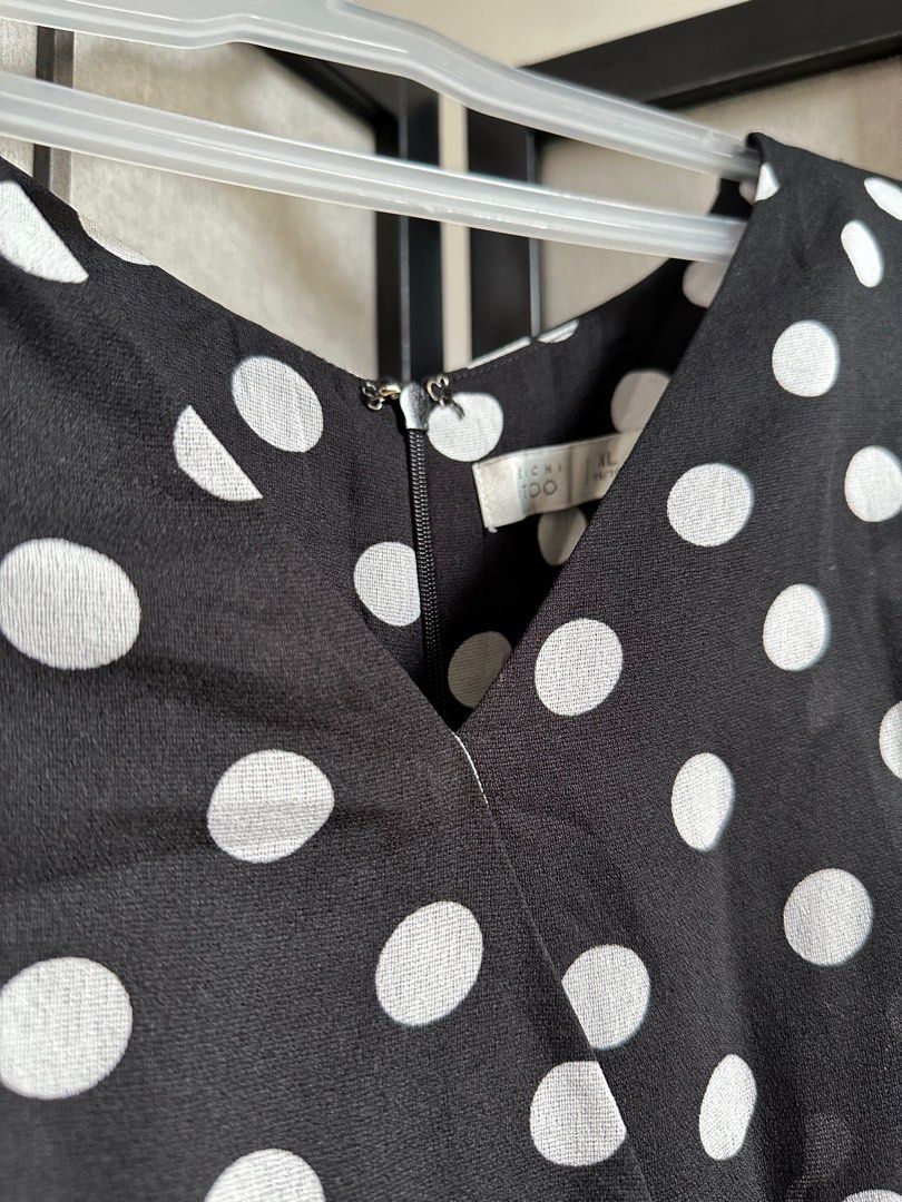 Polka Dot Romper XL (Category: Rompers) located in Manila. Submitted by echrise (Listing ID 1397080559, Image 3). Description: Chiffon fabric Needs inner lining sa taas With inner lining sa baba Waist - 32” Length -30.5” - Black and white polka dot romper - V-neckline - Short sleeves - Back zipper closure - Lined interior - Size: XL.