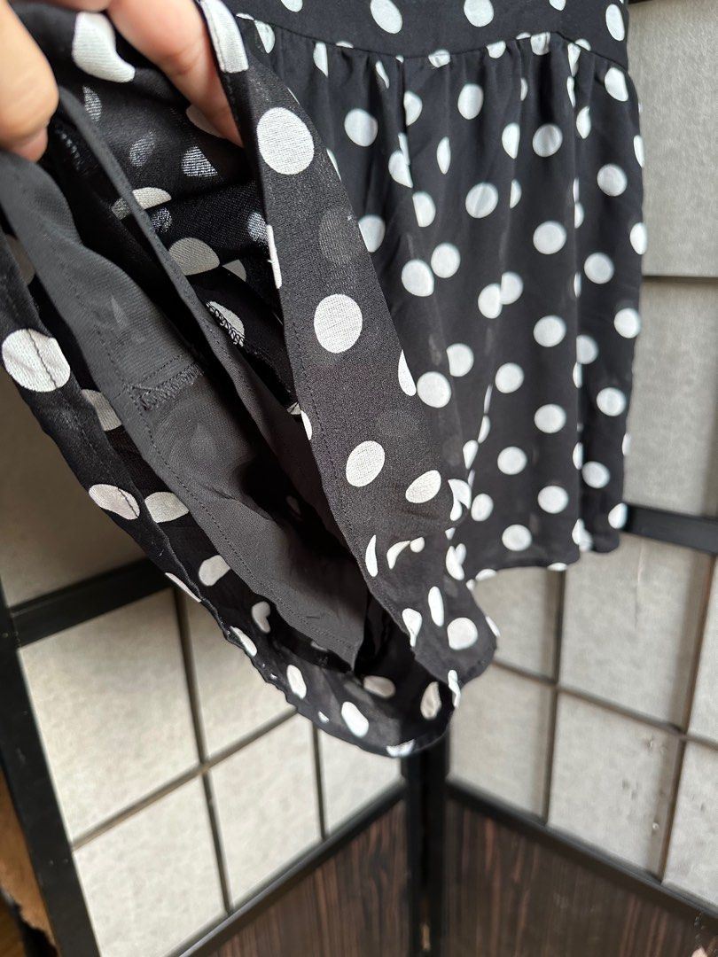 Polka Dot Romper XL (Category: Rompers) located in Manila. Submitted by echrise (Listing ID 1397080559, Image 2). Description: Chiffon fabric Needs inner lining sa taas With inner lining sa baba Waist - 32” Length -30.5” - Black and white polka dot romper - V-neckline - Short sleeves - Back zipper closure - Lined interior - Size: XL.