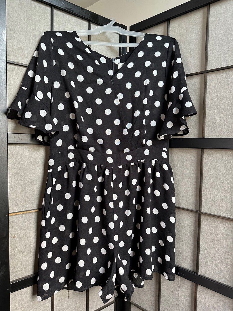 Polka Dot Romper XL (Category: Rompers) located in Manila. Submitted by echrise (Listing ID 1397080559, Image 1). Description: Chiffon fabric Needs inner lining sa taas With inner lining sa baba Waist - 32” Length -30.5” - Black and white polka dot romper - V-neckline - Short sleeves - Back zipper closure - Lined interior - Size: XL.