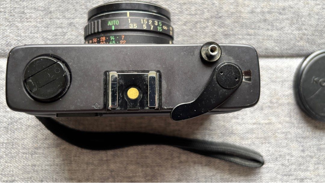Vintage Konica C35 Automatic Film Camera (Category: Cameras) located in Manila. Submitted by _minimalist__ (Listing ID 1397039132, Image 3). Description: - Konica C35 Automatic film camera - Black color - Includes original box, lens cap, strap, and case - Features a Hexanon f2.8 lens - Comes with original documents - Made in Japan.