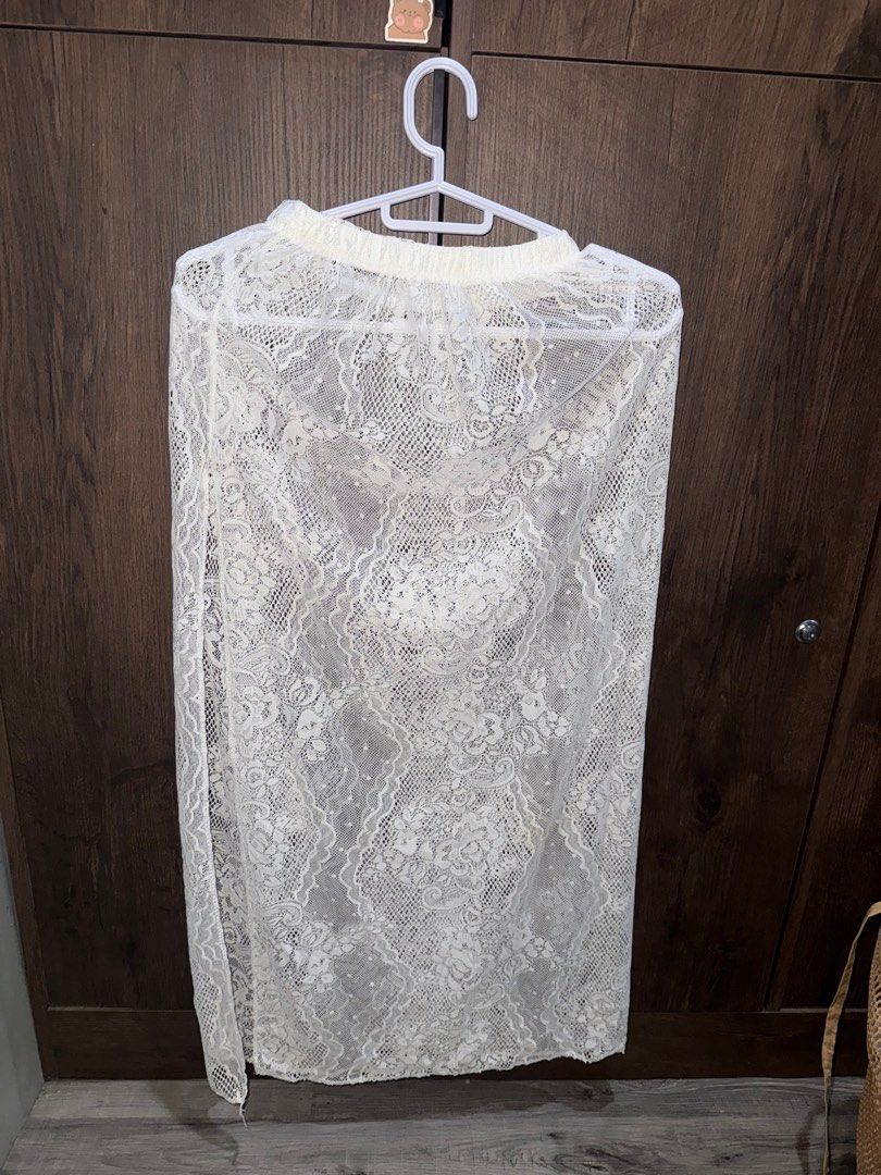 White Lace Skirt cover up (Category: Skirts) located in Caloocan City. Submitted by kinbari (Listing ID 1397155022, Image 1). Description: - White lace midi skirt - Delicate, intricate lace pattern - Elastic waistband - Lightweight and semi-sheer fabric - Perfect for layering.