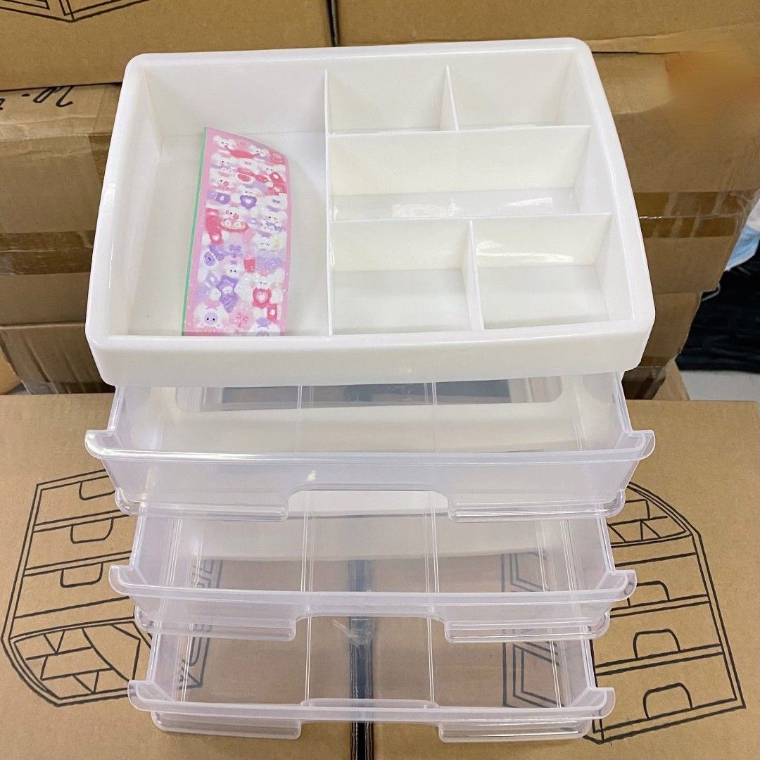 3-Layer make up Drawer organizer (Category: Storage Boxes & Baskets) located in Manila. Submitted by lyfrancois14 (Listing ID 1397313448, Image 2). Description: - Features three clear drawers for easy visibility and access. - Includes a top compartment with multiple sections for organized storage. - Ideal for cosmetics, accessories, and small items. - Drawers are equipped with handles for convenient use. - Top section has dividers for enhanced or