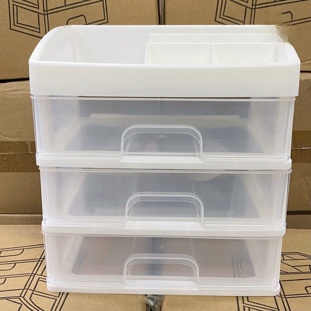3-Layer make up Drawer organizer (Category: Storage Boxes & Baskets) located in Manila. Submitted by lyfrancois14 (Listing ID 1397313448, Image 1). Description: - Features three clear drawers for easy visibility and access. - Includes a top compartment with multiple sections for organized storage. - Ideal for cosmetics, accessories, and small items. - Drawers are equipped with handles for convenient use. - Top section has dividers for enhanced or
