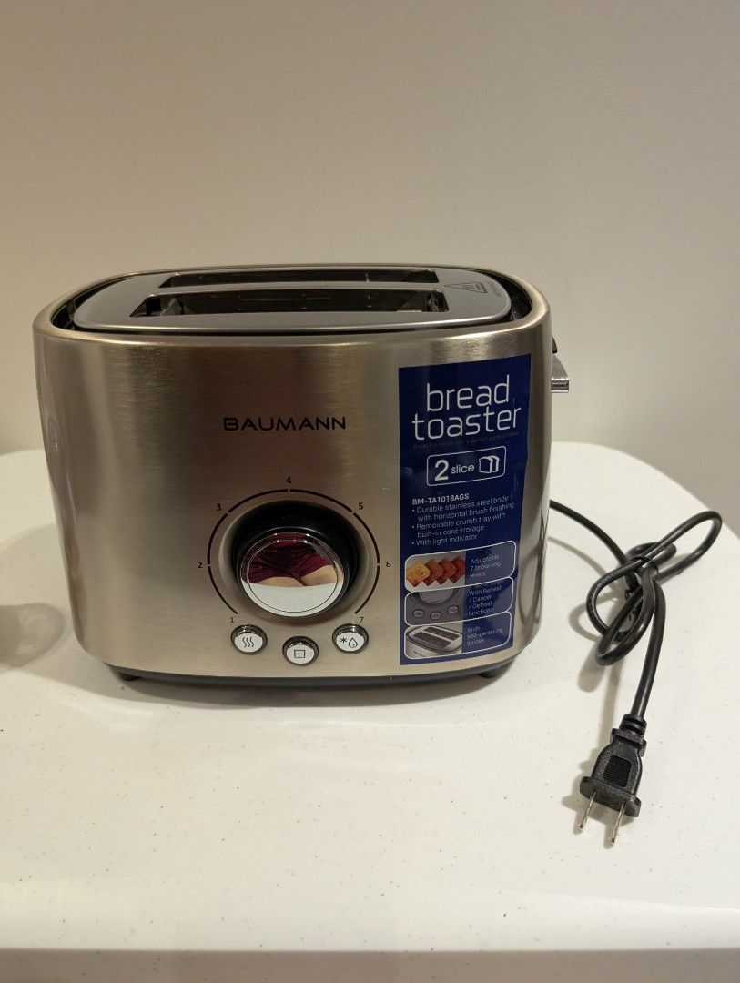 Baumann 2-Slice Bread Toaster (Category: Ovens & Toasters) located in Manila. Submitted by coolshark888 (Listing ID 1397242669, Image 2). Description: - Baumann 2-slice toaster - Stainless steel finish - Adjustable toasting level dial - Multiple toasting function buttons - Removable crumb tray for easy cleaning - Power cord included.