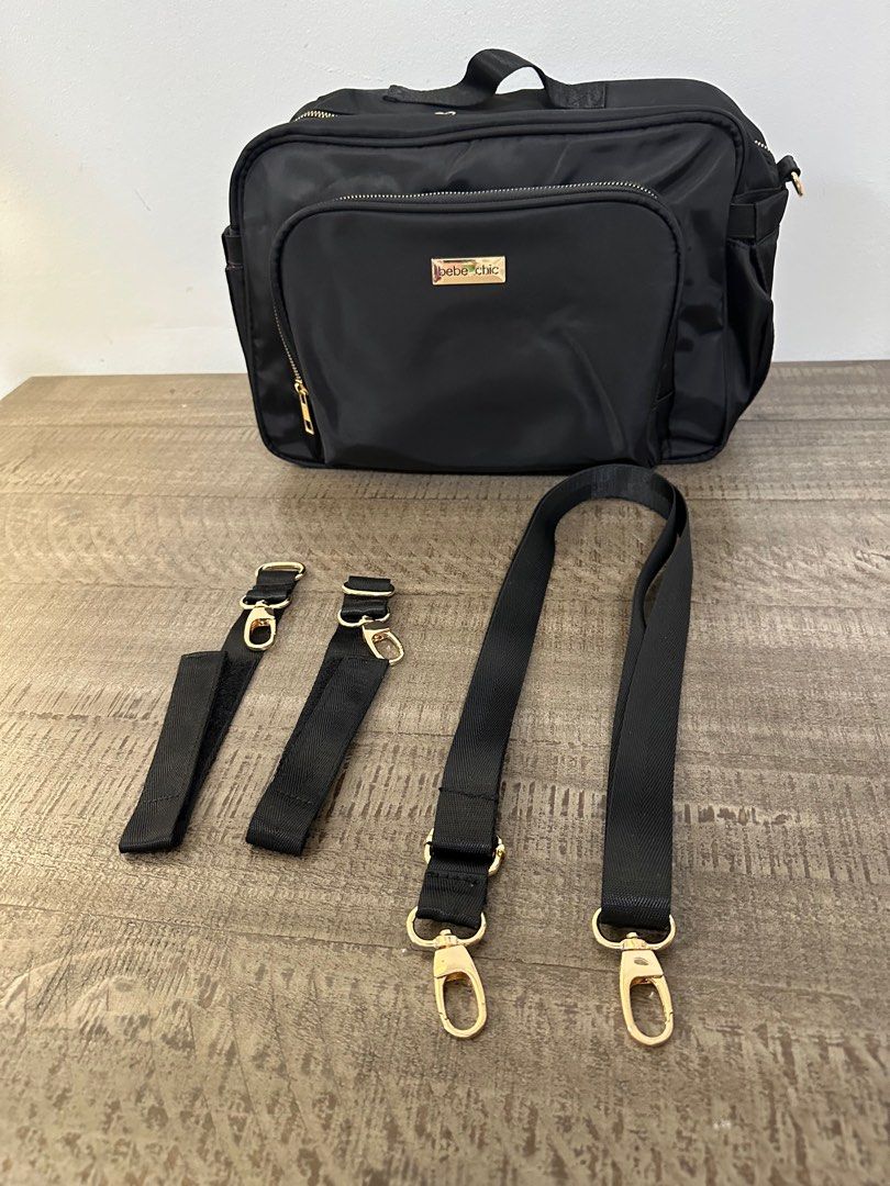 Bebe Chic Addison Stroller Bag- Black (Category: Diaper Bags & Wetbags) located in Makati City. Submitted by msmingchin (Listing ID 1397362526, Image 1). Description: Features: Made of soft, smooth polyester with gold zippers Exterior: One front zippered pocket with organizer pockets inside Two side pockets One back zippered pocket Main compartment: One zippered pocket One slip pocket Two insulated side pockets One gartered pocket Accessories: Sh