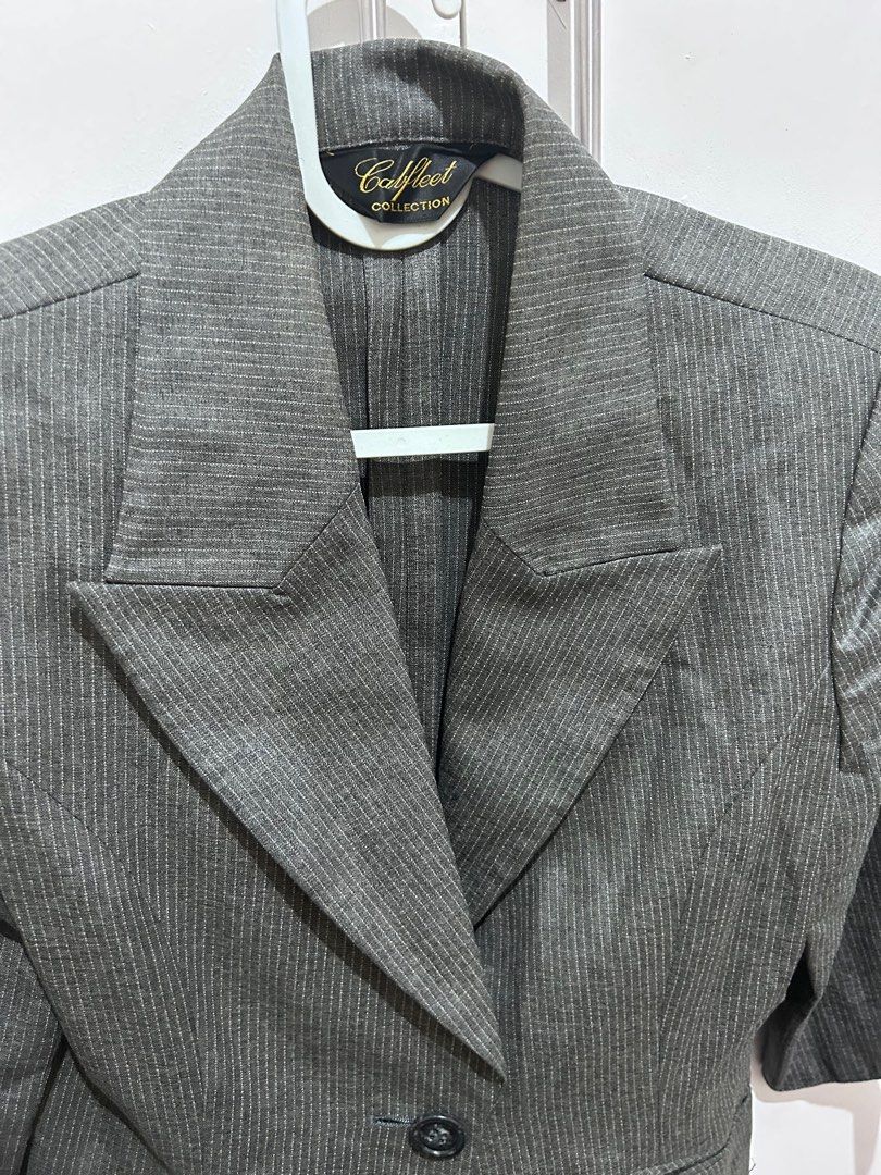 Calfleet Collection Pinstripe Blazer (Category: Coats, Jackets and Outerwear) located in Manila. Submitted by primemover2 (Listing ID 1397312766, Image 1). Description: - Calfleet Collection blazer - Gray pinstripe fabric - Classic design - Single-button closure - Notched lapel - Three-quarter sleeves - Tailored fit - Adds sophistication.