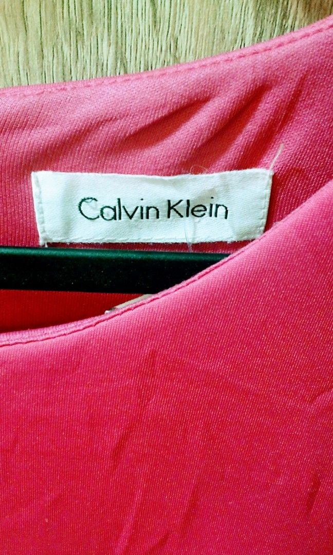 Calvin Klein hot pink dress (Category: Dresses) located in Paranaque City. Submitted by maikeelicious (Listing ID 1397357861, Image 2). Description: Calvin Klein hot pink dress med to large stretchable materials.