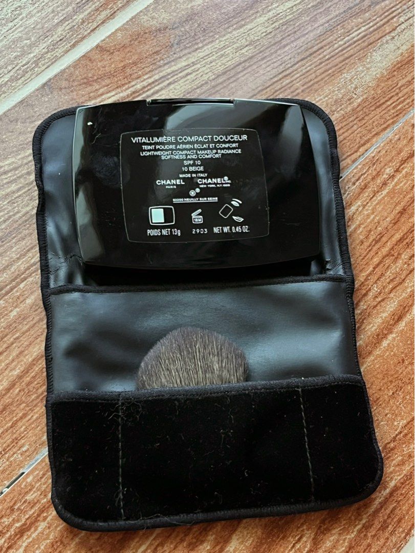 Chanel Vitalumiere Compact Douceur Powder (Category: Makeup) located in Manila. Submitted by kybubs (Listing ID 1397250441, Image 3). Description: Chanel Vitalumiere Compact Douceur powder in shade 10 Beige - Like new. Gifted to me, but not my shade -price is negotiable Includes: - compact with mirror - sponge applicator - brush - velvet pouch 📍Meetup: SM Sucat Foodcourt & Raon Shopping Center MOD: Lalamove / Grab MOP: Gcash / BPI.
