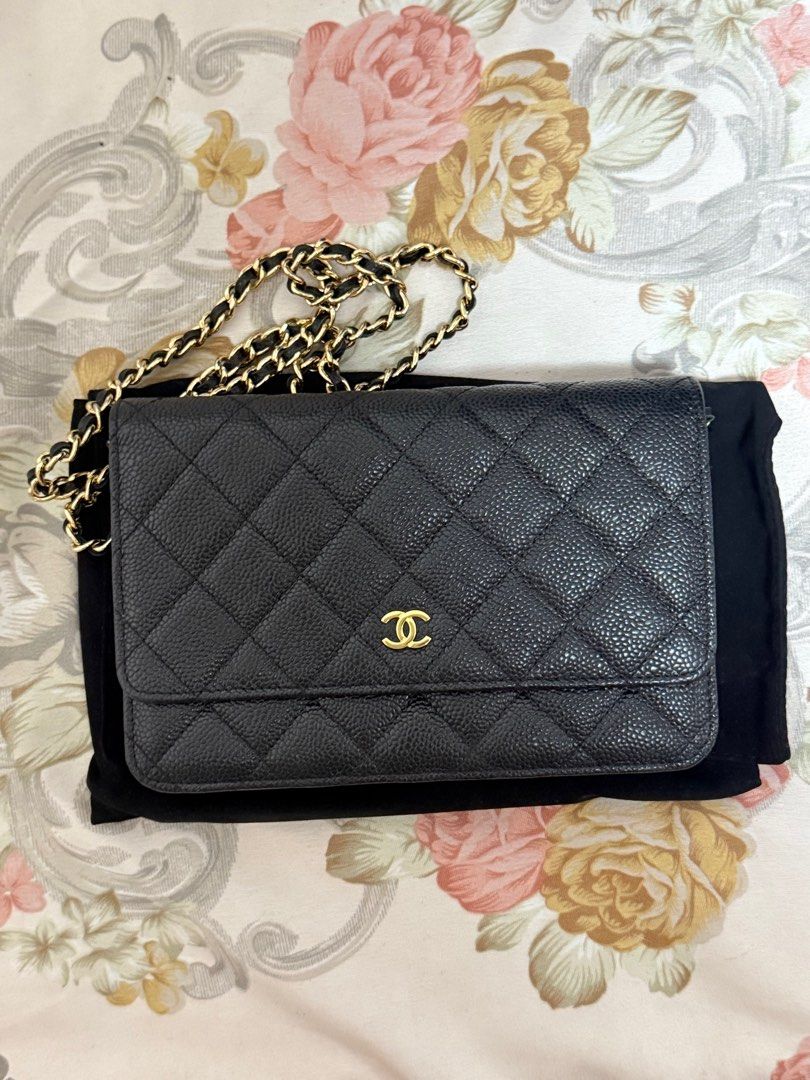 Chanel Wallet on Chain Black Caviar Leather (Category: Luxury Bags & Wallets) located in Quezon City. Submitted by beabeys (Listing ID 1397331265, Image 2). Description: - Chanel Wallet on Chain - Black caviar leather - Gold chain strap - Iconic CC logo - Includes: box, ribbon, authenticity card, care booklet, and dust bag -very good condition - Classic and elegant.